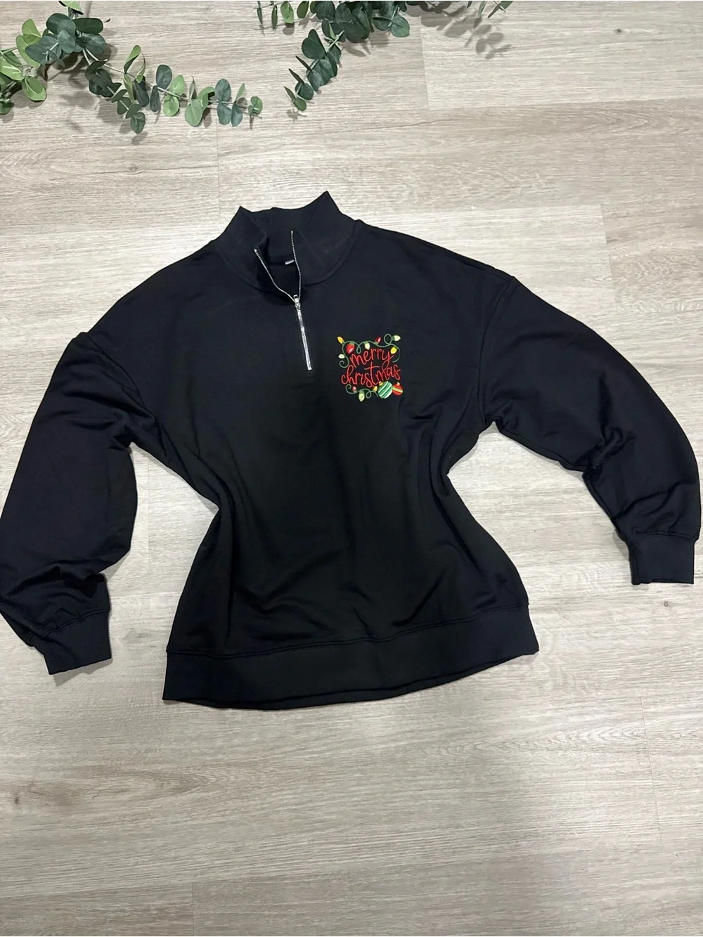 Women's Black Half-Zip Sweater with Festive Chest Embroidery